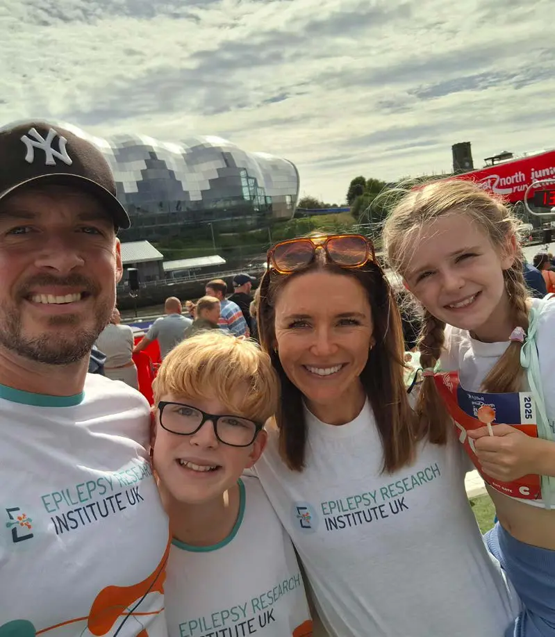 A family supporting Epilepsy Research Institute at an event